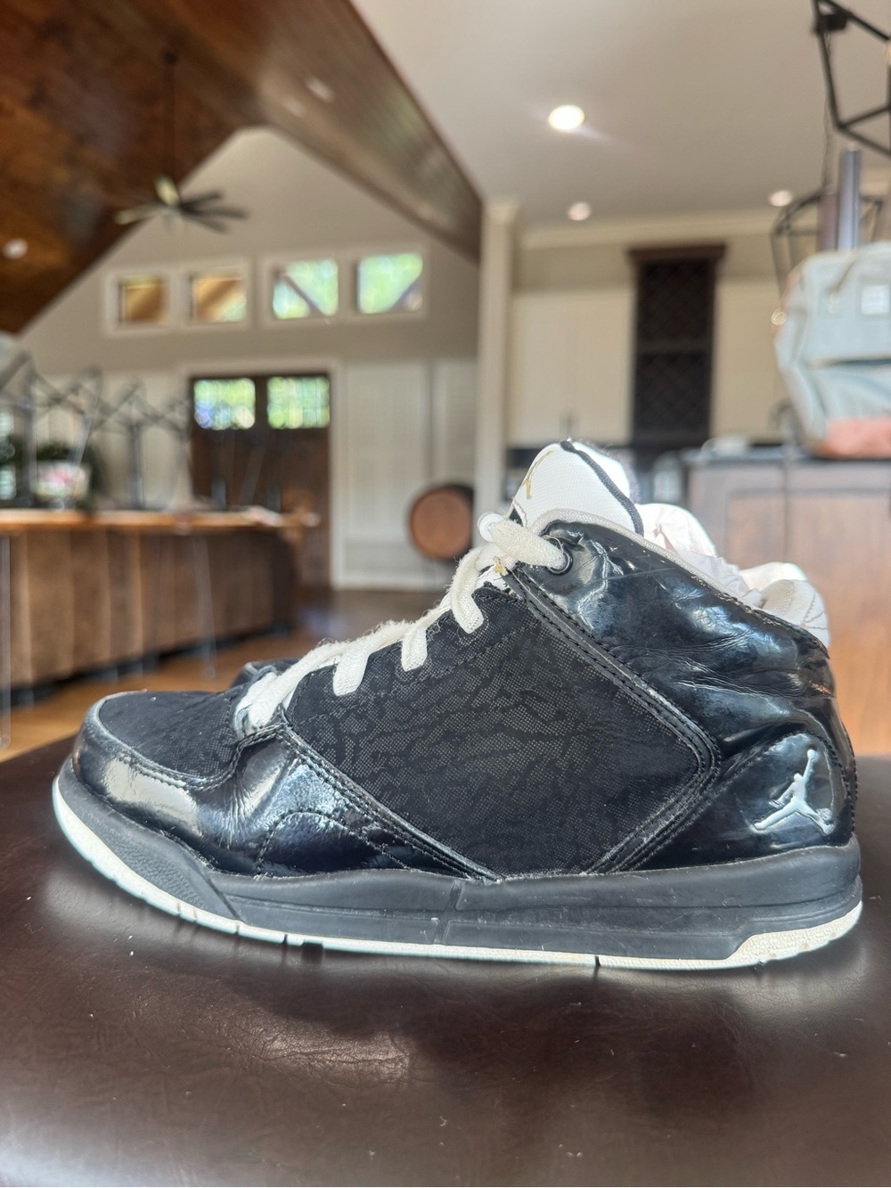Jordan Black and White Mid-Top Basketball Sneaker